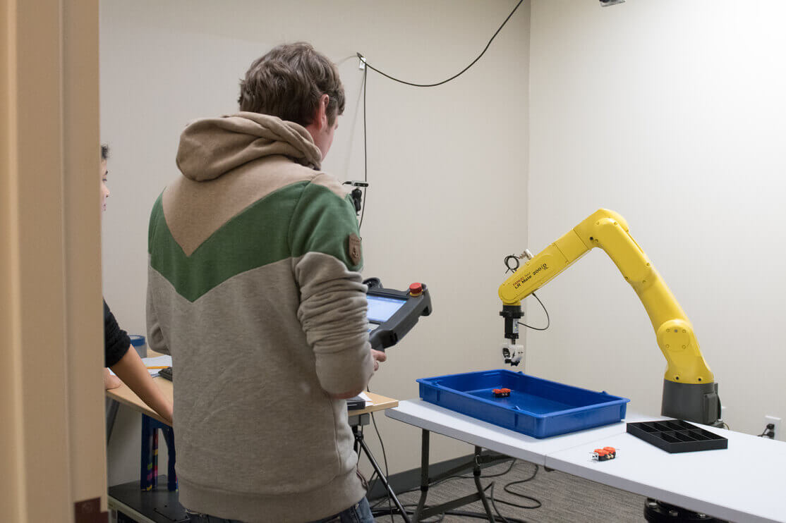 Engineer testing Realtime Robotics technology